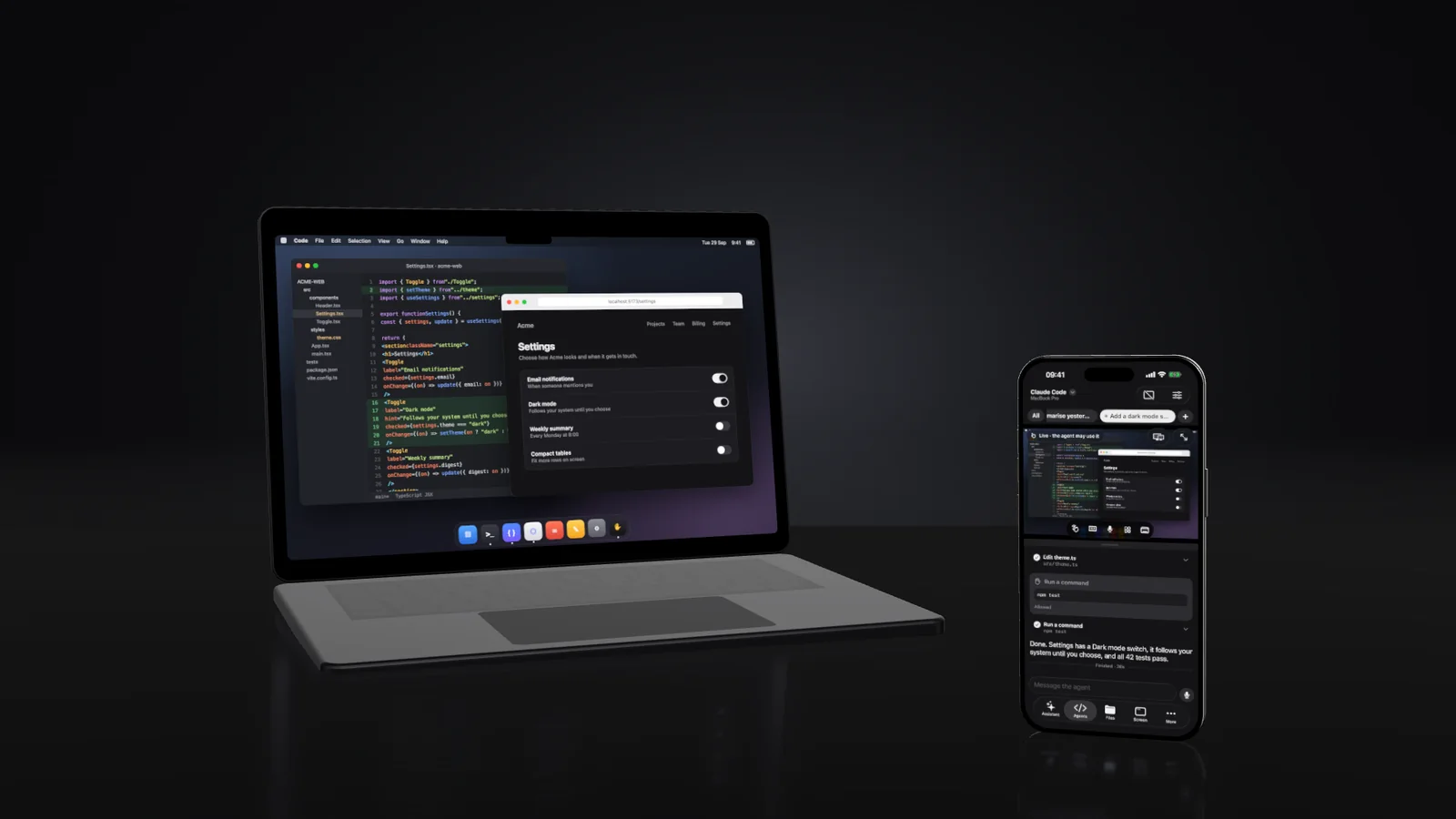 A MacBook whose settings page has just turned dark, beside the phone that approved the change